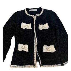 Elegant Black and White Blazer with Bow Accents